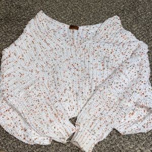 cute knitted sweater, length is shorter but not cropped